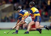 6 June 1999; Declan Corcoran of Tipperary in action against Seamus Murphy of Clare during the Munster Intermediate Hurling Championship match between Tipperary and Clare at Páirc Uí Chaoimh in Cork. Photo by Ray McManus/Sportsfile