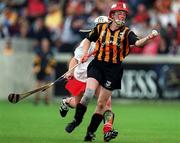 7 August 1999; Jillian Maher of Kilkenny in action against Sarah Hayes of Cork during the Bórd na Gaeilge All Ireland Senior Camogie Championship Semi-Final match between Cork and Kilkenny at Parnell Park in Dublin. Photo by Ray McManus/Sportsfile