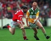 8 August 1999; John Troy of Offaly in action against Wayne Sherlock of Cork during the Guinness All-Ireland Hurling Senior Championship Semi-Final match between Cork and Offaly at Croke Park in Dublin. Photo by Aoife Rice/Sportsfile