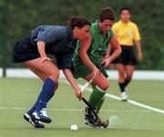 8 August 1999; Kim Mills of Ireland in action against Sandrine Boccara of France during the International women's hockey match between Ireland and France at UCD in Dublin. Photo by Matt Browne/Sportsfile