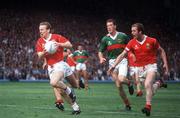 17 September 1989; John Cleary of Cork in action against TJ Kilgallon of Mayo during the All Ireland Football Championship Final match between Mayo and Cork at Croke Park in Dublin. Photo by Ray McManus/Sportsfile