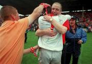 18 July 1999; Cork manager Larry Tompkins celebrates with goalkeeper Kevin O'Dwyer following the Bank of Ireland Munster GAA Football Championship Final match between Cork and Kerry at Páirc Uí Chaoimh in Cork. Photo by Ray McManus/Sportsfile
