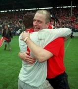 18 July 1999; Cork manager Larry Tompkins celebrates with goalkeeper Kevin O'Dwyer following the Bank of Ireland Munster GAA Football Championship Final match between Cork and Kerry at Páirc Uí Chaoimh in Cork. Photo by Ray McManus/Sportsfile