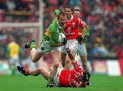 18 July 1999; Liam Hassett of Kerry in action against Eoin Sexton of Cork during the Bank of Ireland Munster GAA Football Championship Final match between Cork and Kerry at Páirc Uí Chaoimh in Cork. Photo by Ray McManus/Sportsfile