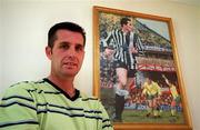 22 July 1999. Liam O'Brien pictured beside a painting of himself playing for Newcastle Utd and Norwich City at his home in Kill, Kildare. Photo by Brendan Moran/Sportsfile