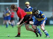 7 August 1999; Pauline Green of Down in action against Emer McDonnell of Tipperary during the All Ireland senior camogie championship semi-final match between Down and Tipperary at Parnell Park in Dublin. Photo by Ray McManus/Sportsfile