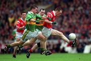 18 July 1999; Philip Clifford of Cork in action against Killian Burns, left, and Seamus Moynihan of Kerry during the Bank of Ireland Munster GAA Football Championship Final match between Cork and Kerry at Páirc Uí Chaoimh in Cork. Photo by Brendan Moran/Sportsfile