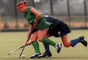 8 August 1999; Sarah Kelleher of Ireland in action against Christelle Lafaury of France during the International women's hockey match between Ireland and France at UCD in Dublin. Photo by Matt Browne/Sportsfile