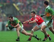 18 July 1999; Seamus Moynihan of Kerry  in action against Joe Kavanagh of Cork during the Bank of Ireland Munster GAA Football Championship Final match between Cork and Kerry at Páirc Uí Chaoimh in Cork. Photo by Brendan Moran/Sportsfile