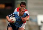 6 June 1999; Shane Ryan of Dublin in action against Sean O'Neill of Louth during the Bank of Ireland Leinster Senior Football Championship Quarter-Final match between Dublin and Louth at Croke Park in Dublin. Photo by Brendan Moran/Sportsfile