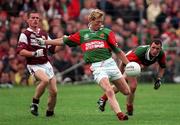 18 July 1999; Ciaran McDonald of Mayo in action against Seán Og de Paor of Galway during the Guinness Connacht Senior Football Championship Final Replay between Mayo and Galway at Tuam Stadium in Galway. Photo by Matt Browne/Sportsfile