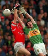 18 July 1999; Michael McCarthy of Kerry in action against Mark O'Sullivan of Cork during the Bank of Ireland Munster GAA Football Championship Final match between Cork and Kerry at Páirc Uí Chaoimh in Cork. Photo by Brendan Moran/Sportsfile