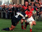 7 August 1999;  Mike Mullins of Munster in action against Shane Byrne of Leinster during the Guinness Interprovincial Rugby Championship match between Munster and Leinster at Temple Hill in Cork. Photo by Matt Browne/Sportsfile