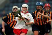 7 August 1999; Miriam Deasy of Cork in action against  Tracey Millea of Kilkenny during the Bórd na Gaeilge All Ireland Senior Camogie Championship Semi-Final match between Cork and Kilkenny at Parnell Park in Dublin. Photo by Ray McManus/Sportsfile