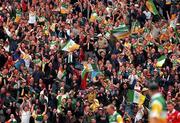 8 August 1999; Offaly supporters celebrate their side scoring a point during the Guinness All-Ireland Hurling Senior Championship Semi-Final match between Cork and Offaly at Croke Park in Dublin. Photo by Ray McManus/Sportsfile