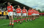 1 August 1999; Oisin McConville of Armagh, left, stands with team-mates ahead of the Bank of Ireland Ulster Senior Football Championship Final match between Armagh and Down at St Tiernach's Park at Clones in Monaghan. Photo by David Maher/Sportsfile