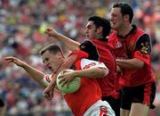 1 August 1999; Paddy McKeever of Armagh in action against Shane Mulholland and Simon Poland of Down during the Bank of Ireland Ulster Senior Football Championship Final match between Armagh and Down at St Tiernach's Park at Clones in Monaghan. Photo by David Maher/Sportsfile
