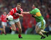 18 July 1999; Padraig O'Mahony of Cork in action against Tomás O'Sé of Kerry during the Bank of Ireland Munster GAA Football Championship Final match between Cork and Kerry at Páirc Uí Chaoimh in Cork. Photo by Ray McManus/Sportsfile