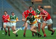 8 August 1999; Paudie Mulhare of Offaly in action against Sean Og O'hAilpin of Cork during the Guinness All-Ireland Hurling Senior Championship Semi-Final match between Cork and Offaly at Croke Park in Dublin. Photo by Ray McManus/Sportsfile