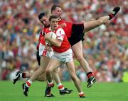 1 August 1999; Paul McGrane of Armagh in action against Sean Ward of Down during the Bank of Ireland Ulster Senior Football Championship Final match between Armagh and Down at St Tiernach's Park at Clones in Monaghan. Photo by David Maher/Sportsfile