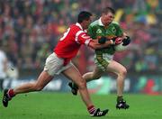 18 July 1999; Tomás O'Sé of Kerry in action against Michael O'Sullivan of Cork during the Munster GAA Football  Championship Final match between Cork and Kerry at Páirc Uí Chaoimh in Cork. Photo by Brendan Moran/Sportsfile