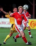 14 July 1999; Trevor Molloy of St Patricks Athletic in action against Serghei Dodul of FSC Zimbru during the UEFA Champions League Qualifying match between St Patricks Athletic and FSC Zimbru at Richmond Park in Dublin. Photo by David Maher/Sportsfile