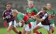 30 July 2006: Cora Staunton, Mayo, in action against Aoibheann DAly, Galway. TG4 Ladies Connacht senior Football Final, Mayo v Galway, McHale Park, Castlebar. Picture Credit: Ray Ryan / SPORTSFILE