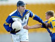 29 July 2006; Matthew O'Donnell, Tipperary, in action against Paul Garvey, Roscommon. ESB All-Ireland Minor Football Championship Quarter-Final, Roscommon v Tipperary, O'Connor Park, Tullamore, Co. Offaly. Picture credit; Matt Browne / SPORTSFILE