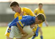 29 July 2006; David Buckley, Tipperary, in action against Keith Waldron, Roscommon. ESB All-Ireland Minor Football Championship Quarter-Final, Roscommon v Tipperary, O'Connor Park, Tullamore, Co. Offaly. Picture credit; Matt Browne / SPORTSFILE