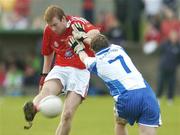 4 August 2006; Mick Fanning, Louth, in action against Darren Hughes, Monaghan. Tommy Murphy Cup Quarter-Final, Louth v Monaghan, St. Brigid's Park, Dowdallshill, Dundalk, Co. Louth. Picture credit; Matt Browne / SPORTSFILE