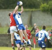 4 August 2006; Brendan McKenna, Monaghan, in action against Paddy Keenan, Louth. Tommy Murphy Cup Quarter-Final, Louth v Monaghan, St. Brigid's Park, Dowdallshill, Dundalk, Co. Louth. Picture credit; Matt Browne / SPORTSFILE