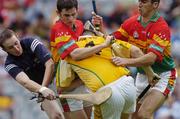 6 August 2006; Patrick Richmond, Antrim, in action against goalkeeper Frank Foley, Eoin Nolan, centre, and Tom Doyle, Carlow. Christy Ring Cup Final, Antrim v Carlow, Croke Park, Dublin. Picture credit; David Maher / SPORTSFILE
