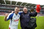 6 August 2006; The Cork full-back Diarmuid O'Sullivan, wearing a Waterford jersey, celebrates victory with the team doctor Con Murphy. Guinness All-Ireland Senior Hurling Championship Semi-Final, Cork v Waterford, Croke Park, Dublin. Picture credit; Ray McManus / SPORTSFILE