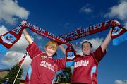 10 August 2006; Drogheda United supporters Peter Mahoney, left, aged 12, and Niamh Pentony, aged 12, both from Drogheda, cheer on their team. UEFA Cup Second Qualifying Round, Second Leg, IK Start v Drogheda United, Kristiansand Stadium, Kristiansand, Norway. Picture credit; David Maher / SPORTSFILE