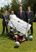 9 July 2014; Chief Executive of the FAI John Delaney with, from left, Donal Conway, FAI and chairman of the  judging panal for the Aviva FAI Club of the Year, Donal Harman, club chariman of  Kilnamanagh AFC, Co. Dublin, and Mark Russell, Aviva, pictured at today’s Aviva FAI Club of the Year Nominees lunch at the Carlton Hotel in Dublin. Eight clubs were nominated across four categories of excellence; Coach Education, Work in the Community, Underage Participation, and Club Development & Facilities. Each club received a cheque for €1,500 and are in contention for the Aviva FAI Club of the Year, which will be announced on the 25th July. Aviva Club of the Year Nominees' Lunch, Carlton Hotel, Tyrrelstown, Co. Dublin. Picture credit: David Maher / SPORTSFILE