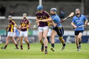 9 July 2014: Jack Guiney, Wexford, in action against Eoghan O'Donnell, Dublin. Bord Gais Energy Leinster GAA Hurling Under 21 Championship Final, Dublin v Wexford, Parnell Park, Dublin. Picture credit: David Maher / SPORTSFILE