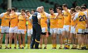 5 July 2014; Antrim manager Liam Bradley speaks to his players before the game. GAA Football All-Ireland Senior Championship, Round 2, Limerick v Antrim, Gaelic Grounds, Limerick. Picture credit: Brendan Moran / SPORTSFILE