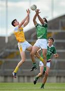 5 July 2014; John Galvin, Limerick, and Niall McKeever, Antrim, contest a kick out. GAA Football All-Ireland Senior Championship, Round 2, Limerick v Antrim, Gaelic Grounds, Limerick. Picture credit: Brendan Moran / SPORTSFILE
