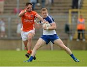 6 July 2014; Colin Walshe, Monaghan, in action against Eugene McVerry, Armagh. Ulster GAA Football Senior Championship, Semi-Final Replay, Armagh v Monaghan, St Tiernach's Park, Clones, Co. Monaghan. Picture credit: Piaras Ó Mídheach / SPORTSFILE
