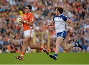 6 July 2014; Stefan Campbell, Armagh, in action against Fintan Kelly, Monaghan. Ulster GAA Football Senior Championship, Semi-Final Replay, Armagh v Monaghan, St Tiernach's Park, Clones, Co. Monaghan. Picture credit: Piaras Ó Mídheach / SPORTSFILE