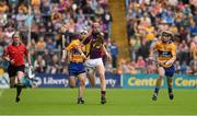 12 July 2014; Andrew Shore, Wexford, races clear of Conor McGrath, left, and Tony Kelly, Clare. GAA Hurling All-Ireland Senior Championship Round 1 Replay, Clare v Wexford, Wexford Park, Wexford. Picture credit: Ray McManus / SPORTSFILE