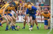 12 July 2014; Clare goalkeeper Patrick Kelly, supported by his defenders, moves to clear the ball while under pressure from Podge Doran,  Wexford. GAA Hurling All-Ireland Senior Championship Round 1 Replay, Clare v Wexford, Wexford Park, Wexford. Picture credit: Ray McManus / SPORTSFILE