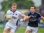 12 July 2014; Donal Kingston, Laois, in action against Paddy Codd, Tipperary. GAA Football All-Ireland Senior Championship Round 3A, Laois v Tipperary, O'Moore Park, Portlaoise, Co. Laois. Picture credit: Matt Browne / SPORTSFILE