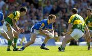 29 July 2006; Brian Kavanagh, Longford, in action against Tom O'Sullivan, left, Michael McCarthy and Paul Galvin, right, Kerry. Bank of Ireland All-Ireland Senior Football Championship Qualifier, Round 4, Kerry v Longford, Fitzgerald Stadium, Killarney, Co. Kerry. Picture credit; Brendan Moran / SPORTSFILE