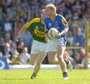 29 July 2006; Padraig Berry, Longford, in action against Tomas O Se, Kerry. Bank of Ireland All-Ireland Senior Football Championship Qualifier, Round 4, Kerry v Longford, Fitzgerald Stadium, Killarney, Co. Kerry. Picture credit; Brendan Moran / SPORTSFILE