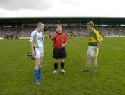 29 July 2006; Referee Vincent Neary tosses the coin between captains Damien Sheridan, left, Longford, and Colm Cooper, Kerry. Bank of Ireland All-Ireland Senior Football Championship Qualifier, Round 4, Kerry v Longford, Fitzgerald Stadium, Killarney, Co. Kerry. Picture credit; Brendan Moran / SPORTSFILE