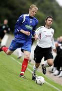 12 August 2006; Gary Hamilton, Glentoran, in action against Daragh Peden, Loughgall. CIS Insurance Cup, Loughgall v Glentoran, Lakeview Park, Loughgall, Co. Armagh. Picture credit: Russell Pritchard / SPORTSFILE