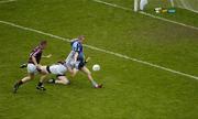 12 August 2006; Westmeath goalkeeper Gary Connaughton, supported by Francis Boyle, 4, punches the ball from the feet of Dublin's Tomas Quinn. Bank of Ireland All-Ireland Senior Football Championship, Quarter-Final, Dublin v Westmeath, Croke Park, Dublin. Picture credit; Ray McManus / SPORTSFILE