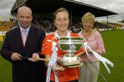 12 August 2006; Cork captain Joanne O'Callaghan with Tom Keogh, left, Chief Executive of Gala Retail Services and Liz Howard, President of the Camogie Association. Gala All-Ireland Senior Camogie Championship, Semi-Final, Cork v Galway, Nowlan Park, Kilkenny. Picture credit; Matt Browne / SPORTSFILE