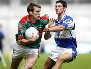 13 August 2006; Ronan McGarrity, Mayo, in action against Brendan Quigley, Laois. Bank of Ireland All-Ireland Senior Football Championship Quarter-Final, Mayo v Laois, Croke Park, Dublin. Picture credit; Damien Eagers / SPORTSFILE